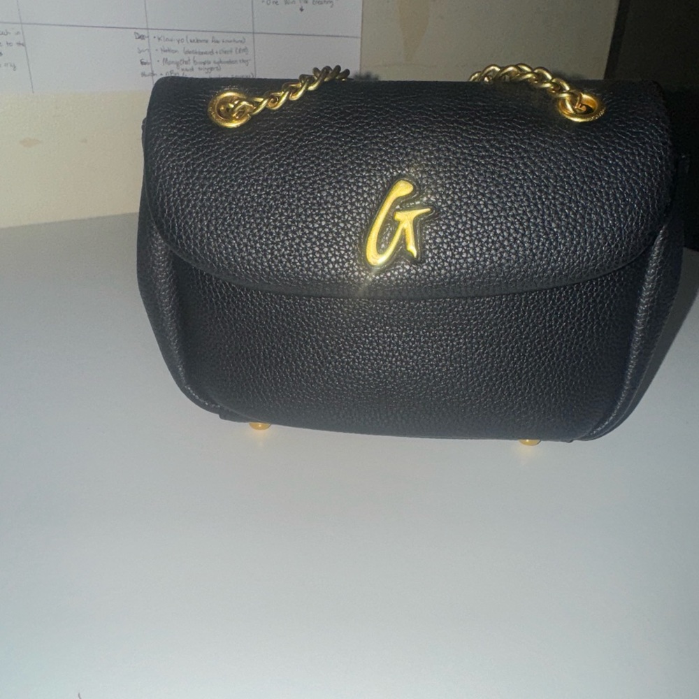 Elegant Black Shoulder Bag with Gold Accents